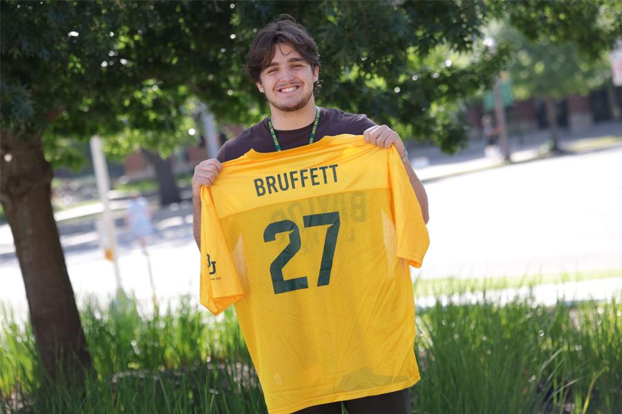 Everett Bruffett poses with his Baylor Line jersey