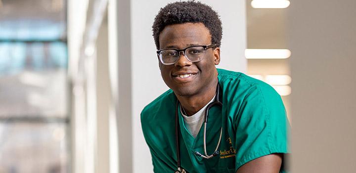 Ethan Kigozi, a Baylor nursing student