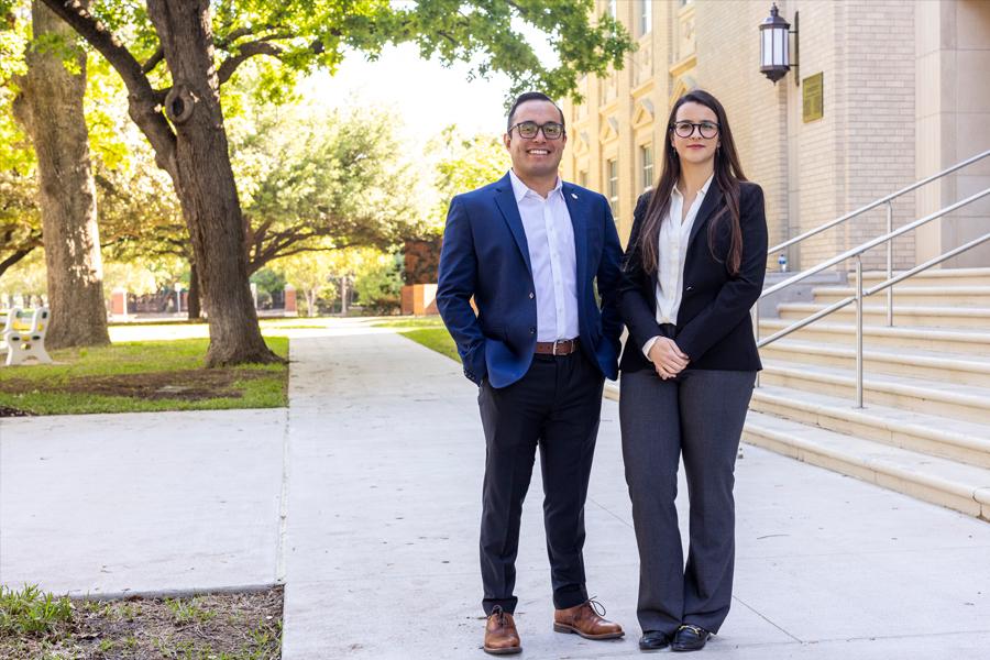Dr. Marilia Corea and Dr. Ricardo Alvarez-Pimentel stand on Baylor campus